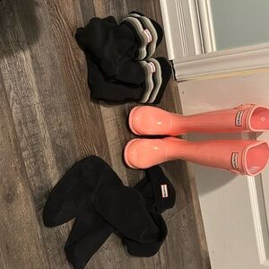 Brand new Hunter boots with 2 pairs of socks.